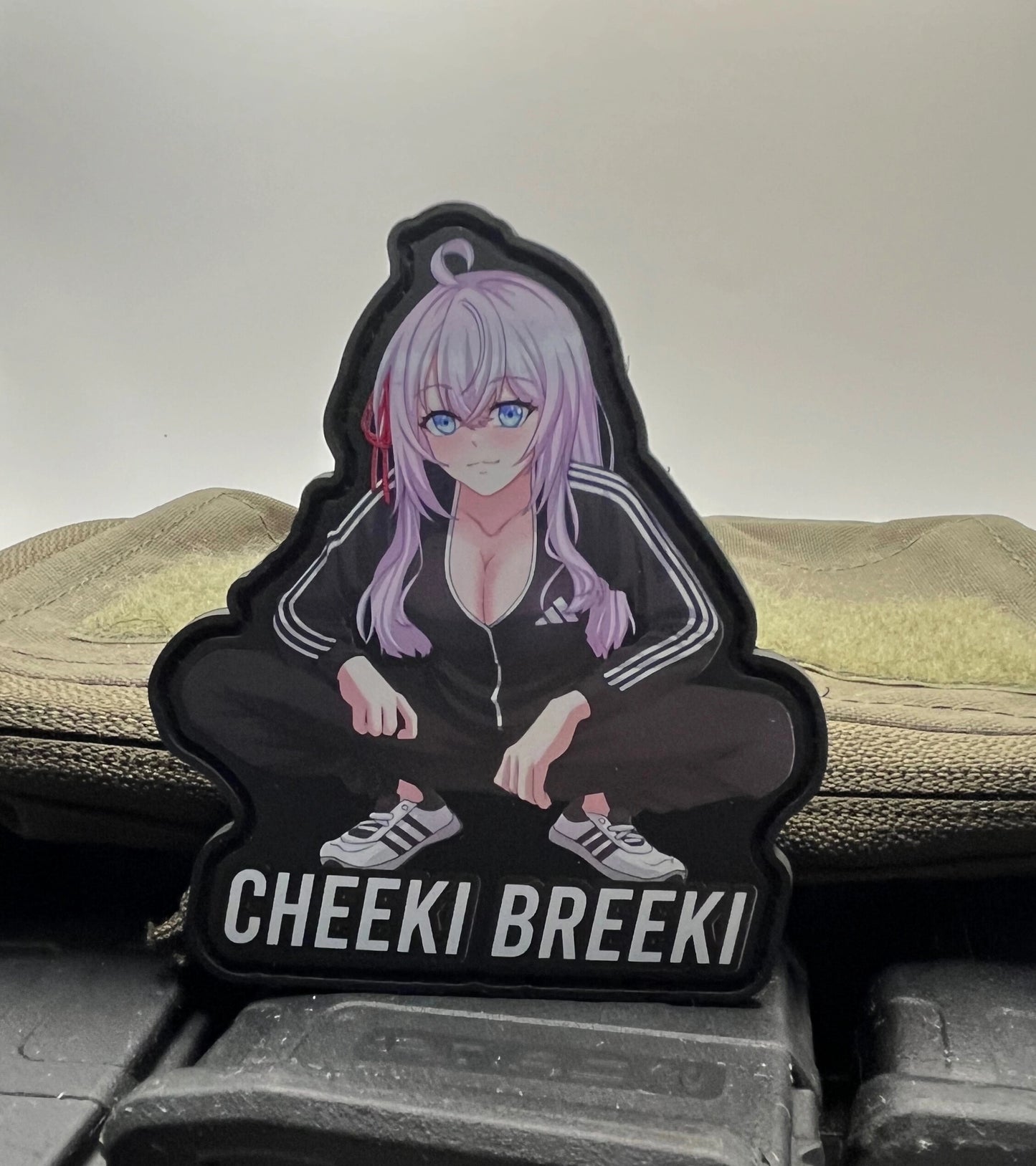 Anime Alya Russian with 'Cheeki Breeki' text on a textured surface