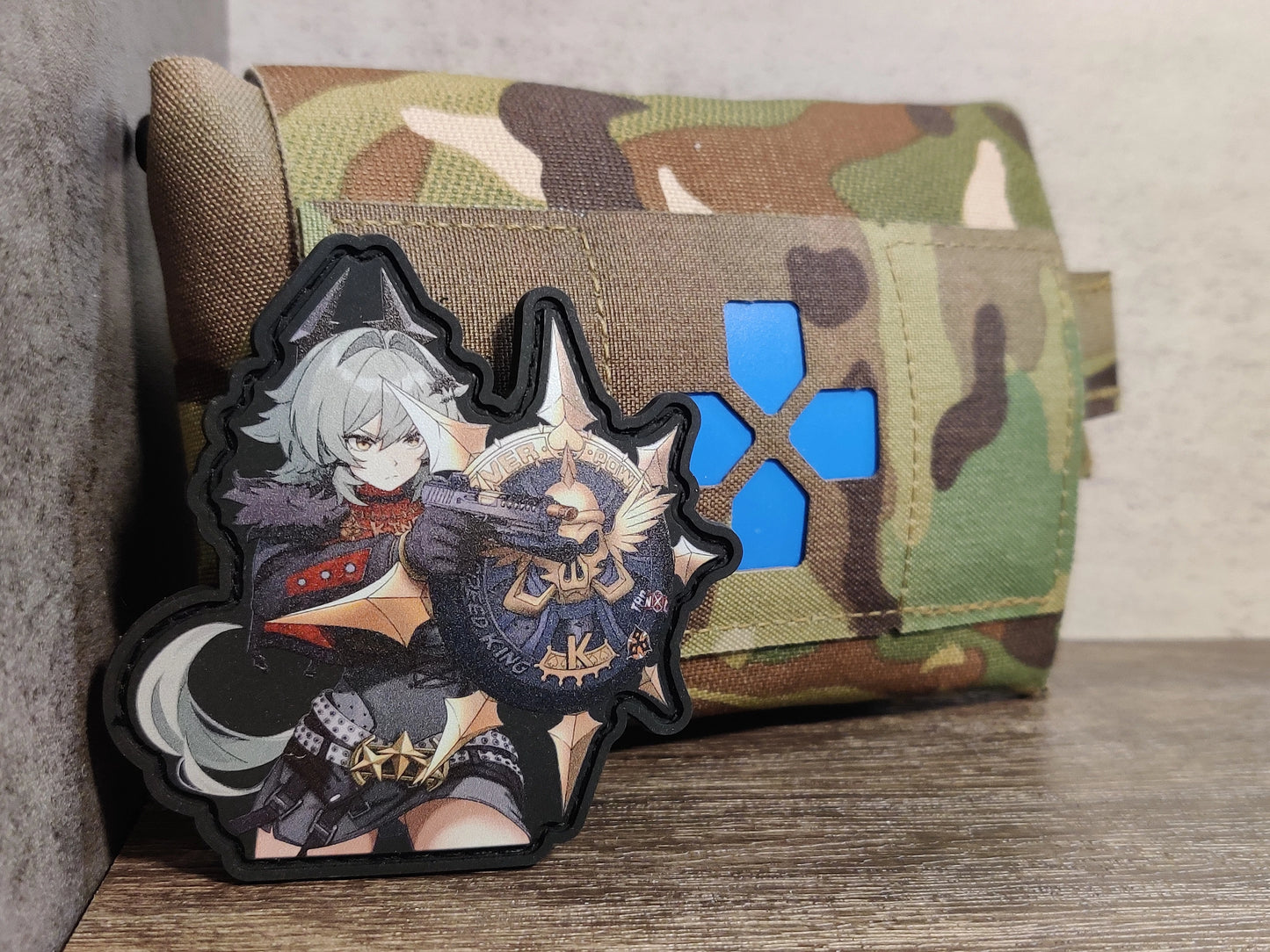 Custom made UV-Printed PVC patches featuring Caesar King, from Zenless Zone Zero wielding her shield and her pistol for close quarter operation.