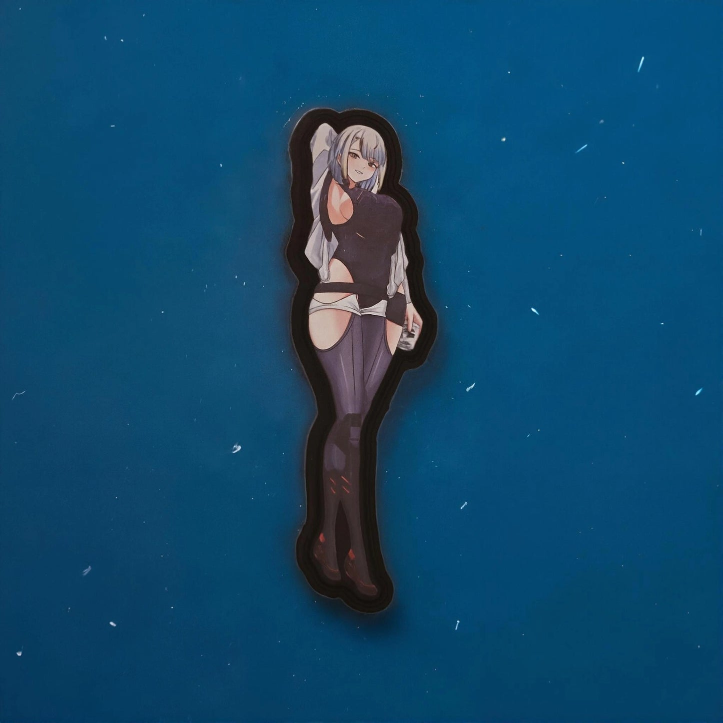 patch of Lucy from Cyberpunk:Edgerunners on a blue background