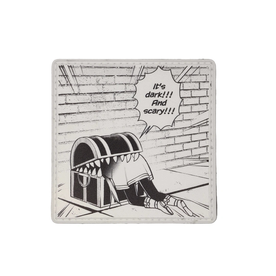 Cartoon character peeking from a dark alleyway with a speech bubble saying 'It's dark!!! And scary!!!'.