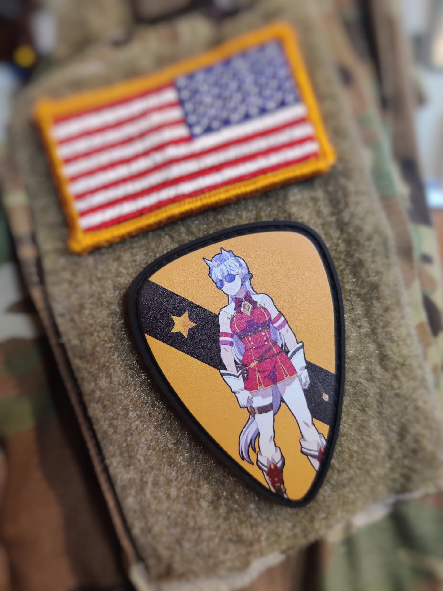gold ship from uma musume combined with 1st calvary patch of shield shape design with American flag on a camouflage background.