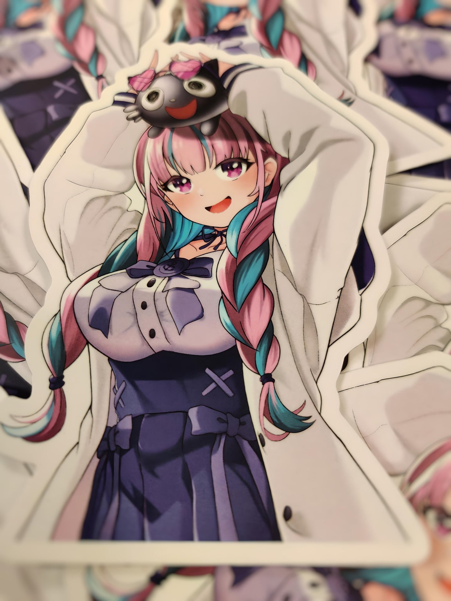 Custom design sticker featuring Minato Aqua from Hololive holding a cute cat above her head pose.