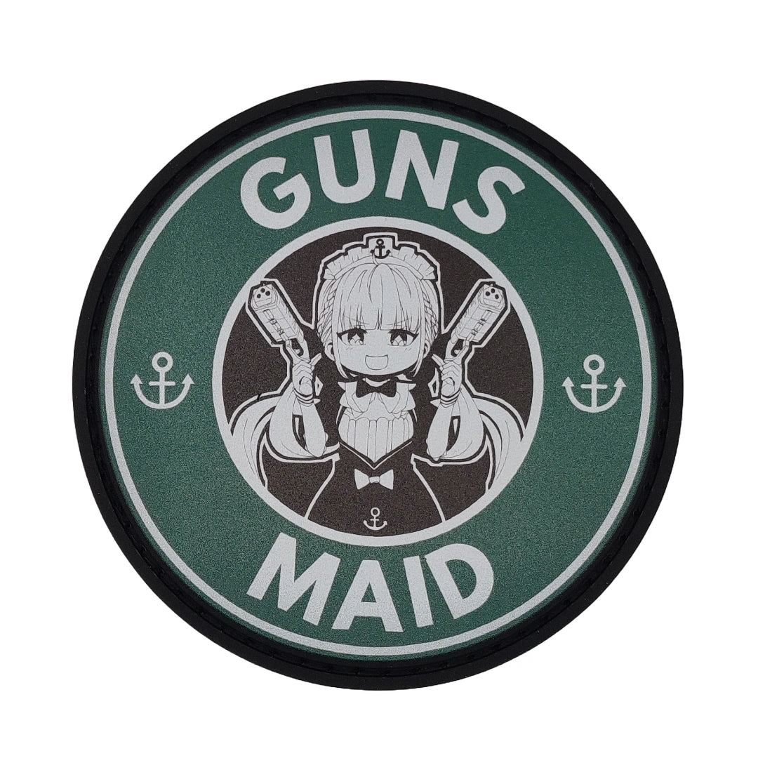 Circular patch with an illustration of a Minato Aqua both hand holding a gun and text 'GUNS MAID' on a green background.