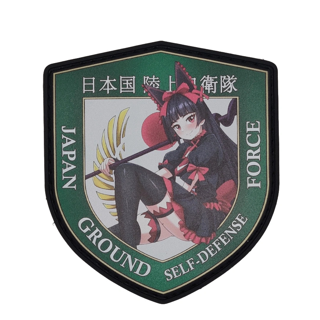 Shield-shaped emblem of Japan Ground Self-Defense Force with an illustrated Rory Mercury from the Anime, Gate on a white background