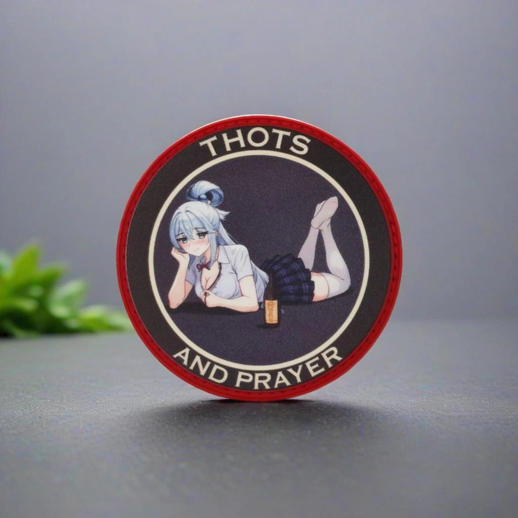 Circular product with anime-style character and text 'THOTS AND PRAYER' on a gray background