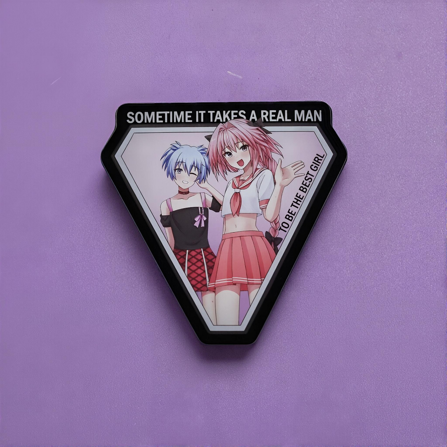 Hexagonal patch with anime-style illustration of Astolfo and Nagisa with the text sometime it takes a real man to be the best girl on a purple background
