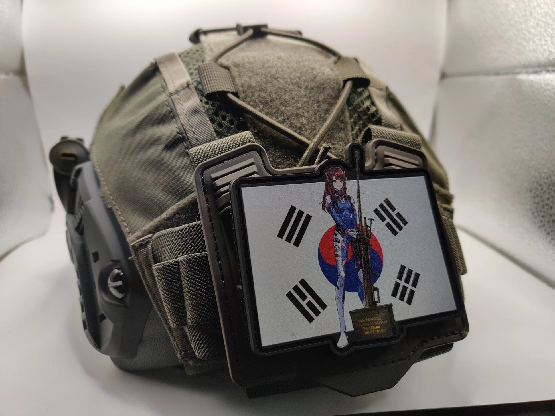 Helmet with a display showing a D.Va from the game Overwatch and South Korean flag on a white background