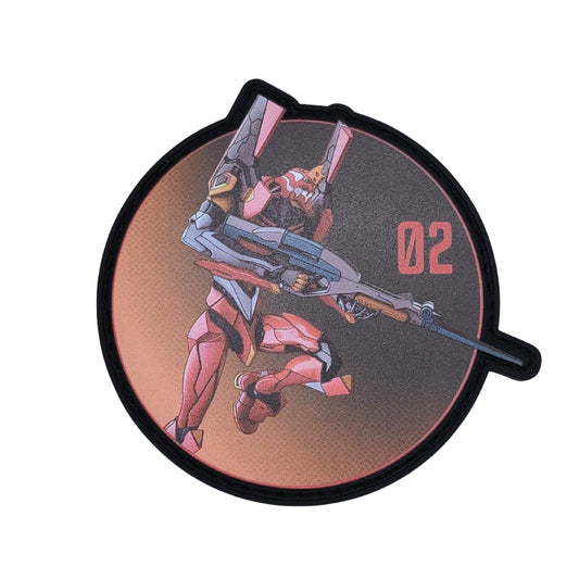 A circular patch featuring an anime-style illustration of a pink and white mecha robot holding a rifle, with the red text '02' on the right, set against a black background with a black stitched border.