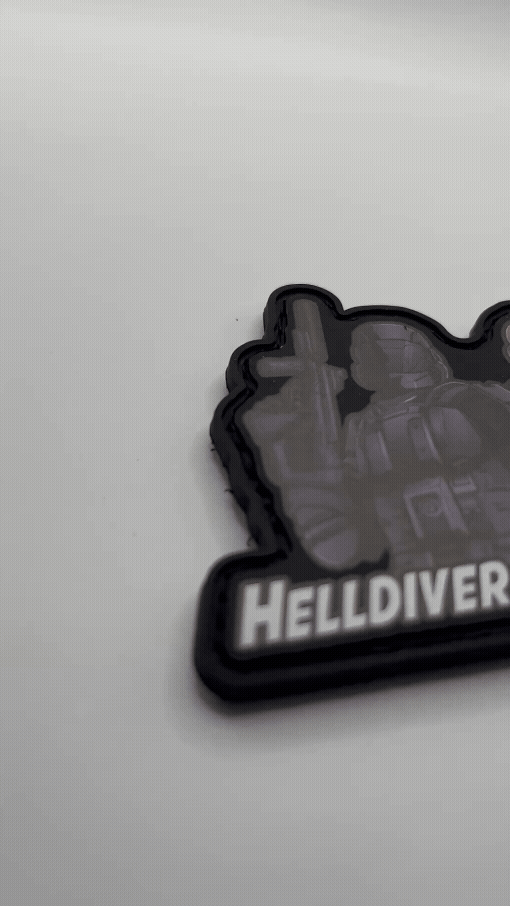 Sticker of two characters from 'Helldiver X Helljumper' with weapons on a white background.