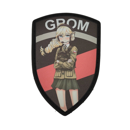 Shield-shaped patch with Jajka from Girls und Panzer: Ribbon Warrior and 'GROM' text on a white background