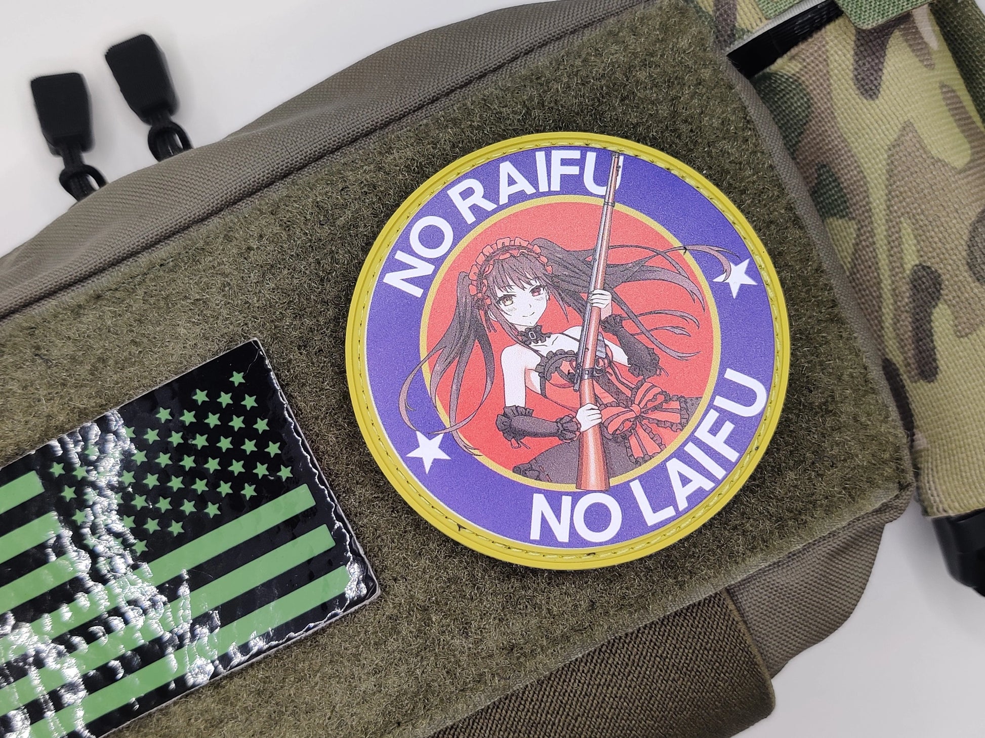 Patch with an anime character and text on a bag