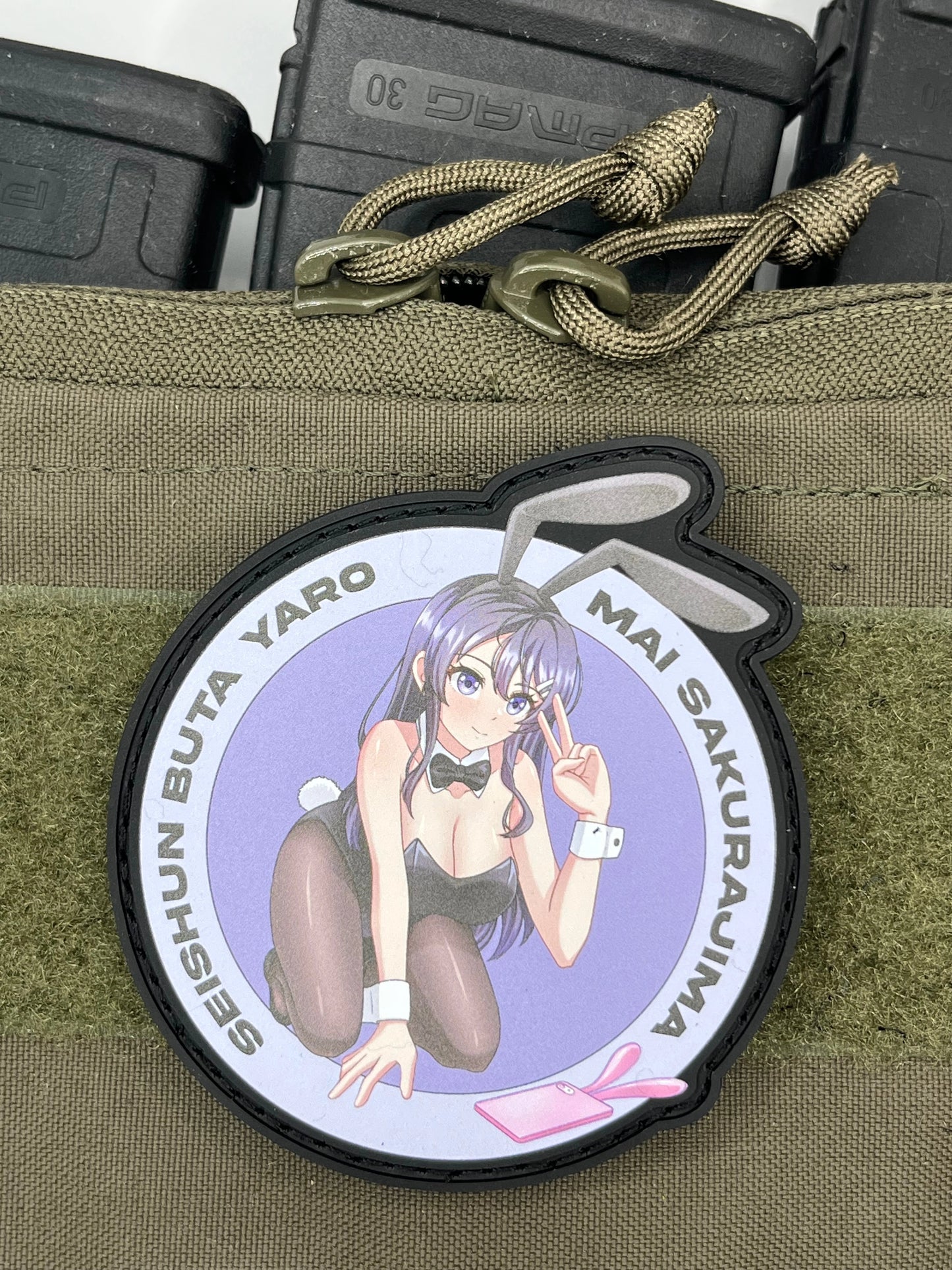 Anime character Mai_Sakurajima patch on a green tactical pouch with branding visible