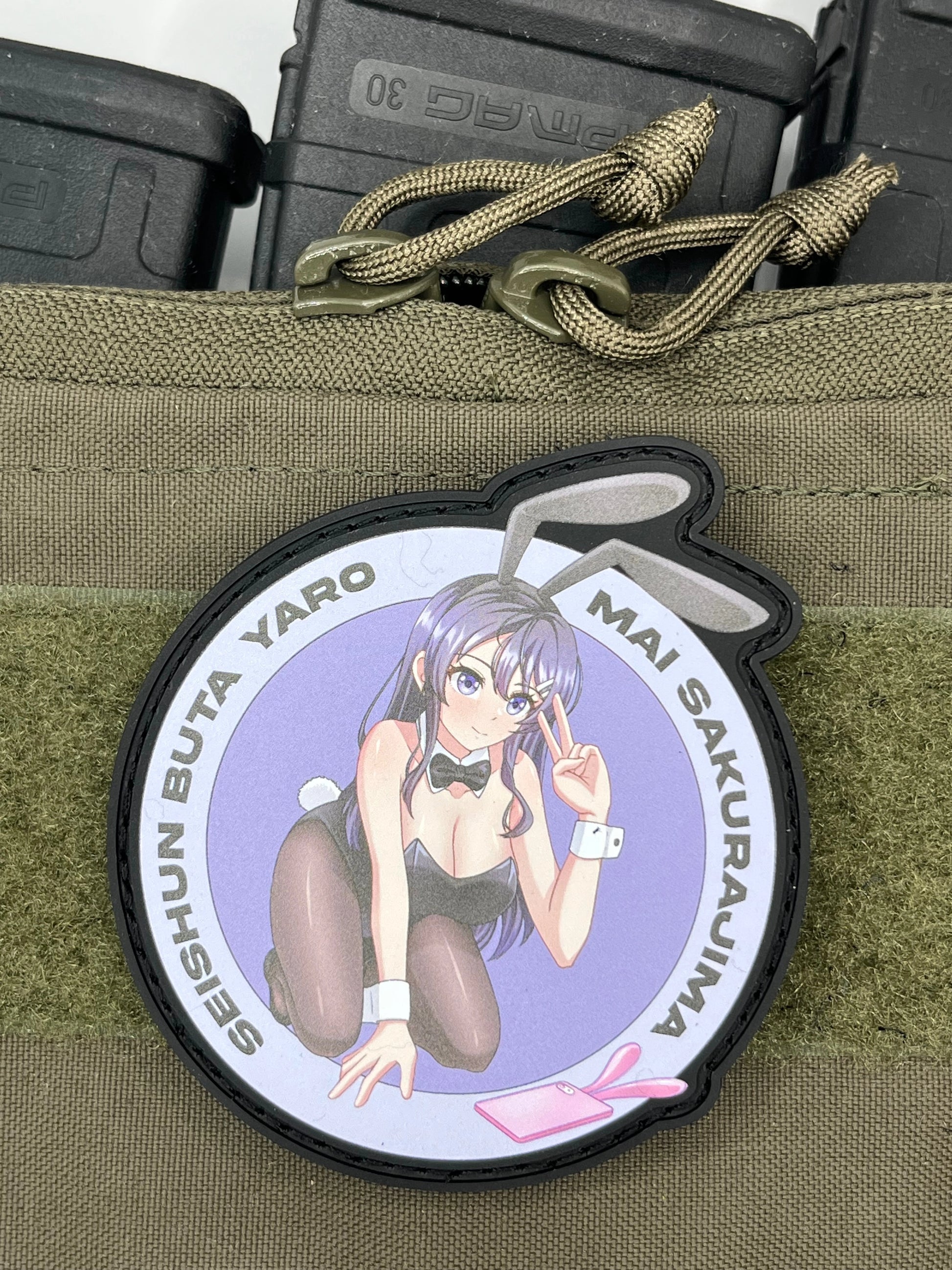 Anime character Mai_Sakurajima patch on a green tactical pouch with branding visible