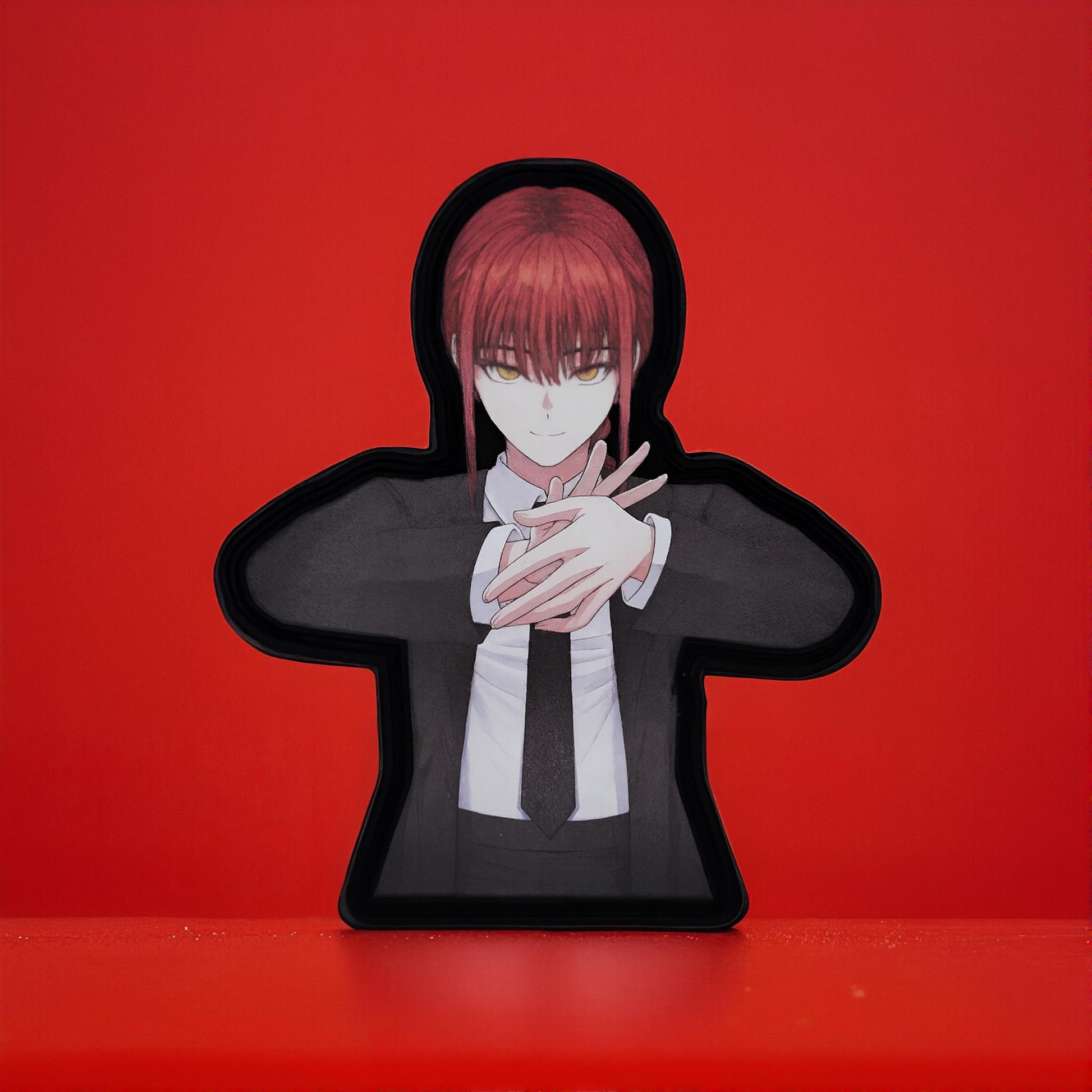 Patch of Makima from Chainsaw Man Anime with red hair and suit and tie clothing on a red background