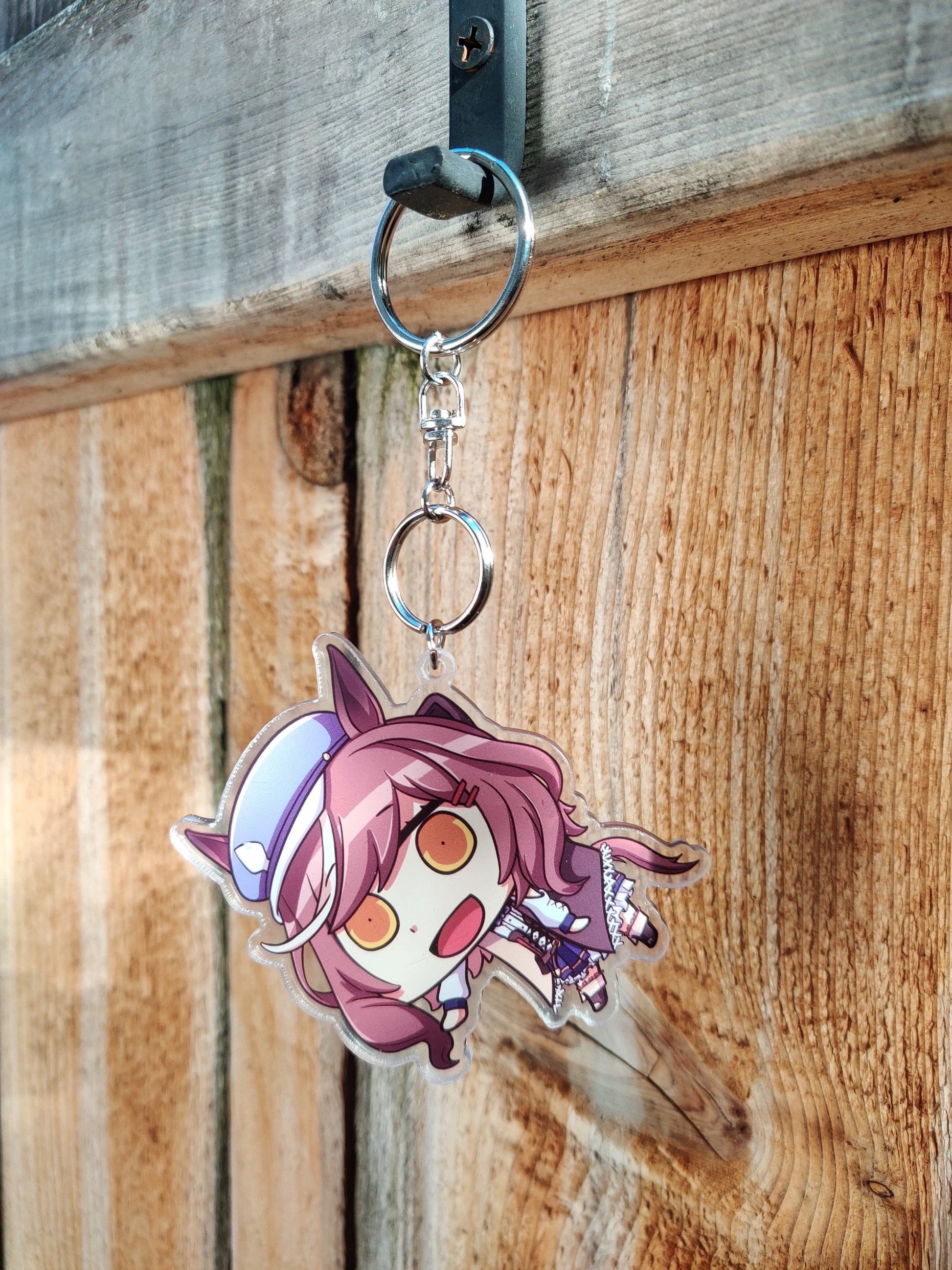 Matikanetannhauser_Acrylic_Keychain_uma_musume_prop-wooden-background