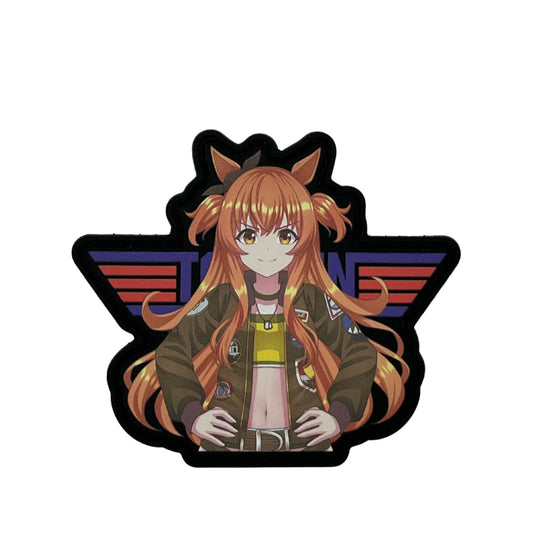 Mayano Top Gun standing in front of the top gun red white and blue logo