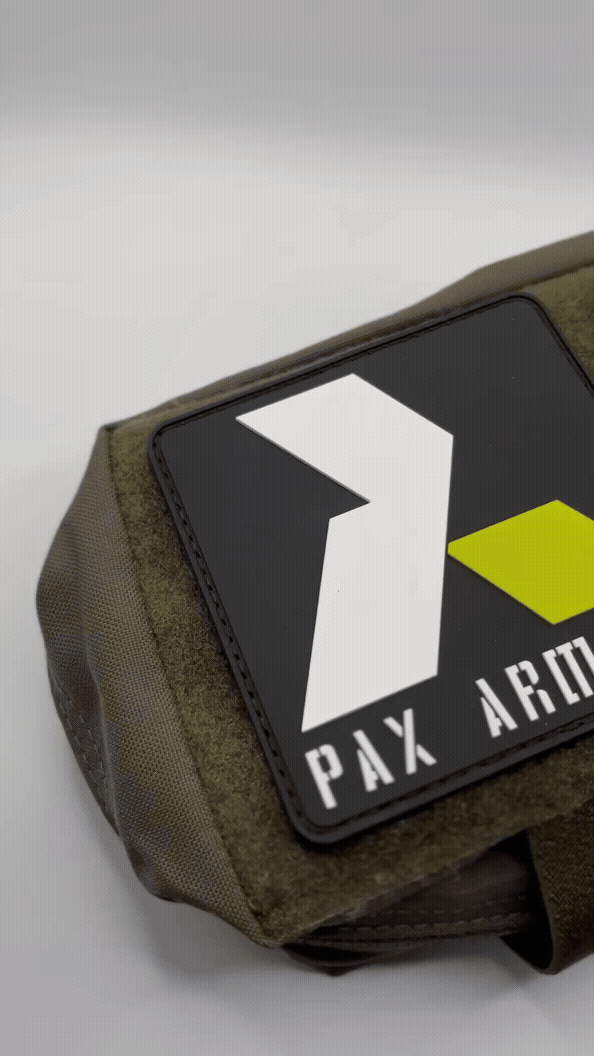 Logo of Pax Armata with a stylized letter 'A' on a black background and NATO Patch