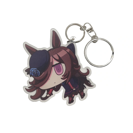 Anime character Rice Shower from uma musume keychain with a white background