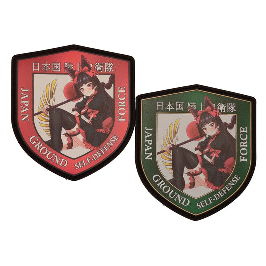 Two shield-shaped patches featuring Rory Mercury from anime Gate text related to the Japan Ground Self-Defense Force on a white background.