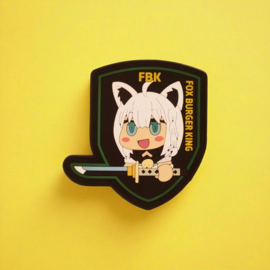 Animated character with fox ears holding a sword on a shield with 'FBK' and 'FOX BURGER KING' text against a yellow background.