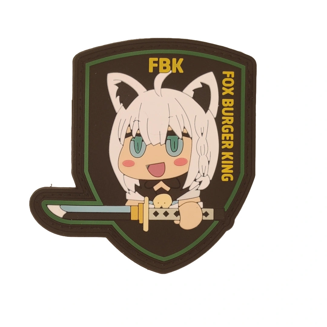 Patch with cartoon character and 'Fox Burger King' text on a shield-shaped background