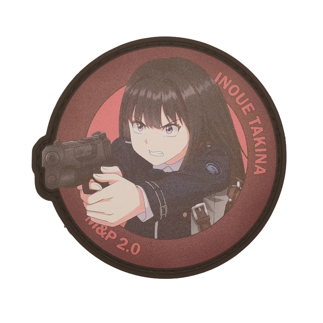 Circular product with Takina Inoue holding a gun and text on a white background