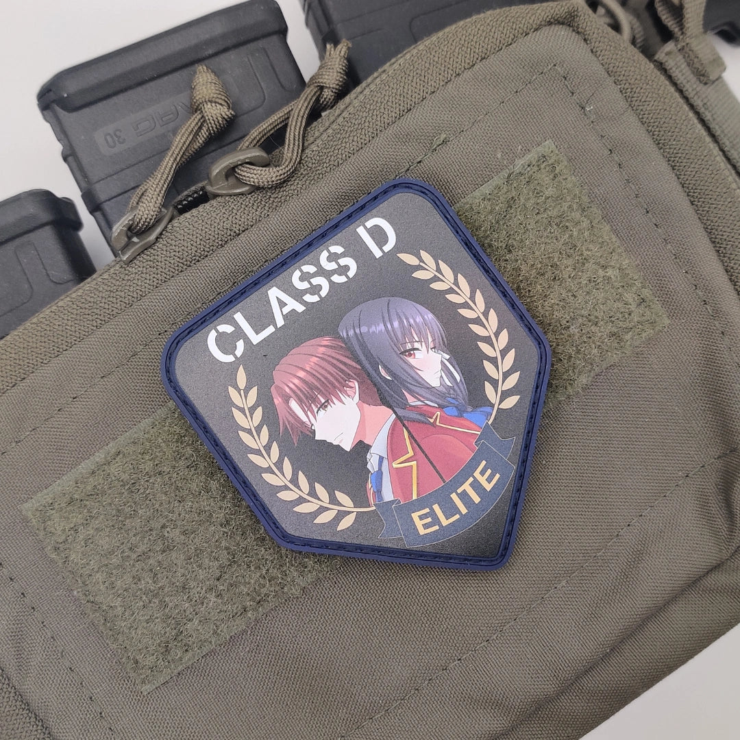 Ayanokoji and Horikita Class D Elite anime patch attached to a MOLLE pouch with magazines in the background