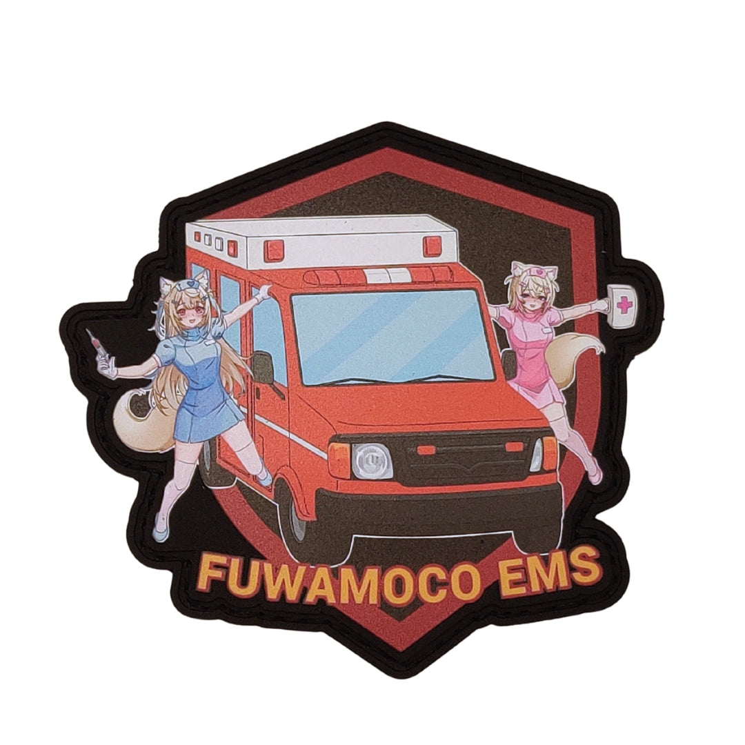FUWAMOCO EMS patch 3.4 inches featuring Fuwawa and Mococo paramedics in blue and pink uniforms with red ambulance and "FUWAMOCO EMS" text on dark background