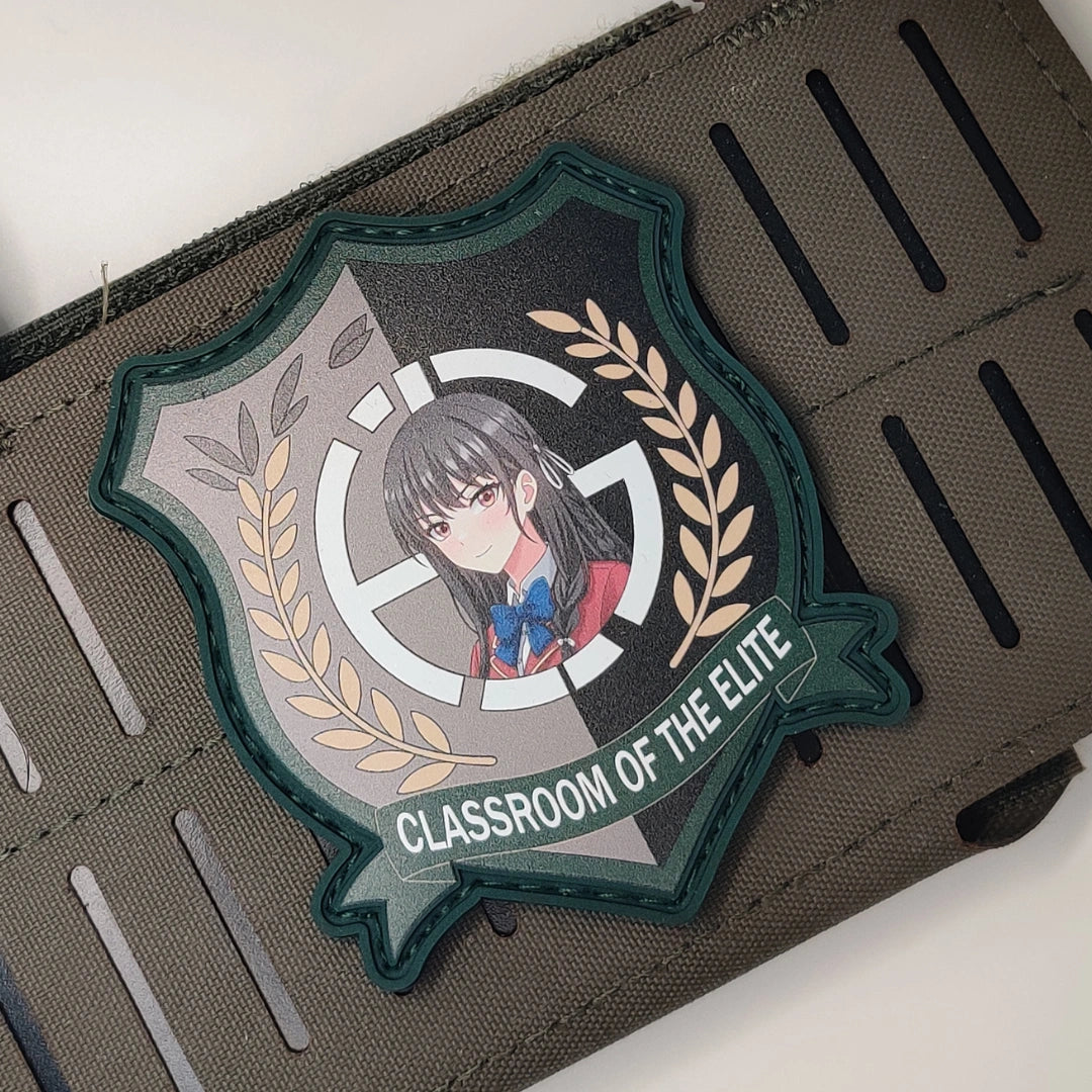 Green border Suzune Horikita Classroom of the Elite patch velcroed to tan MOLLE tactical webbing