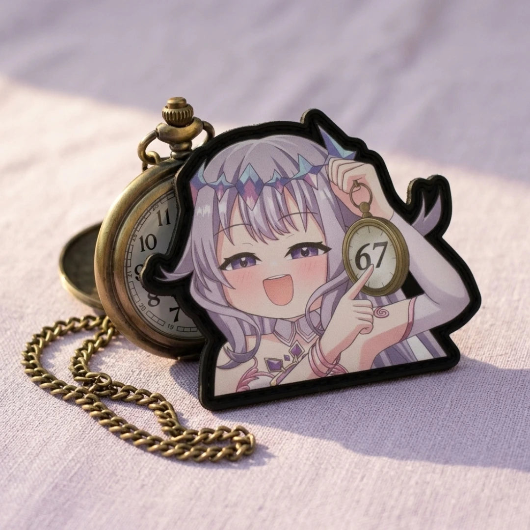 Koseki Bijou "67" meme patch 3.4 inches displayed with vintage brass pocket watch prop, showing Jewel of Emotions design with purple hair and brain rot meme aesthetic