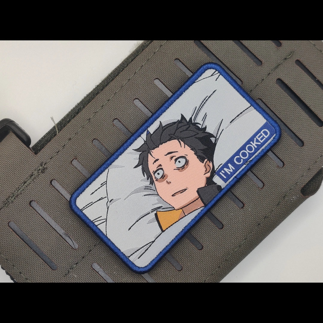 Natsuki Subaru "I'm Cooked" Re:Zero patch attached to tactical vest — premium 3.5 inch woven Velcro anime meme patch for jackets and gear
