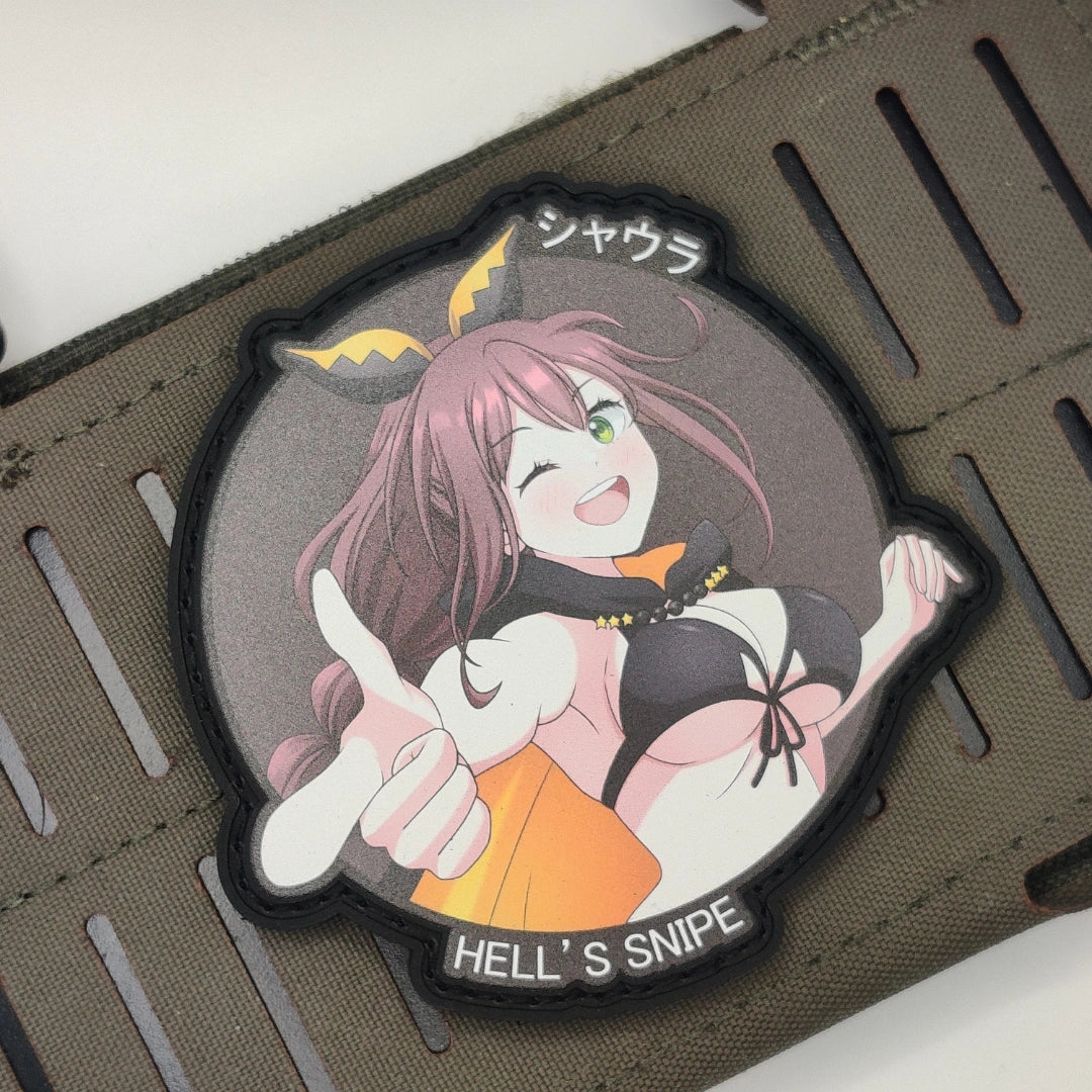 Shaula Hell's Snipe velcro patch on tactical gear, showing UV print detail and hook backing with gold trim